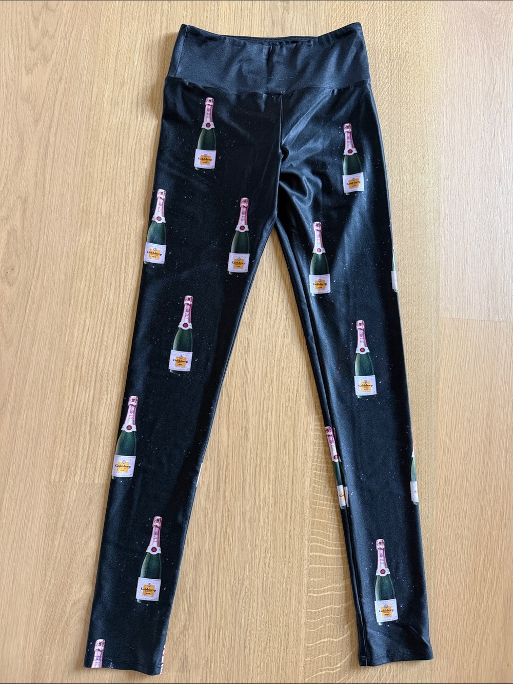 Goldsheep High-Waist Black Leggings with Champagne Bottle Print